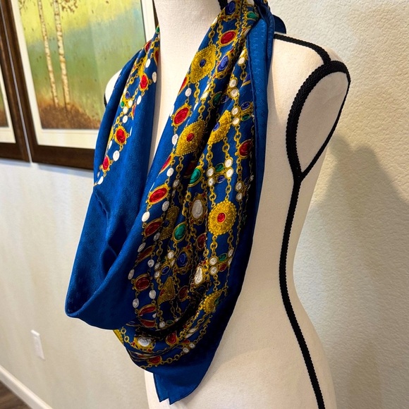 Authentic CHANEL Blue Scarf with Gold and Red Accents